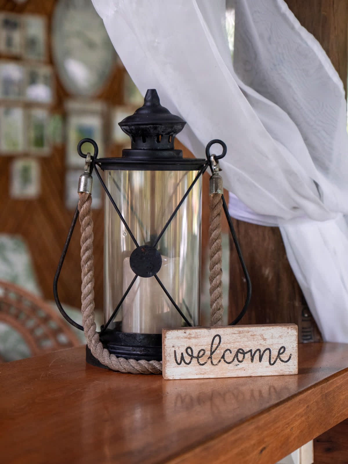 Lantern and welcome sign in a guest room